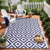 imageOLANLY Waterproof Outdoor Rug 5x8 ft Clearance Reversible Outdoor Plastic Straw Rug RV Mat Indoor Outdoor Carpet for Patio Camping Balcony Deck Backyard Black ampamp WhiteNavy Blue  White
