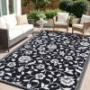imageOLANLY Waterproof Outdoor Rug 5x8 ft Outdoor Plastic Straw Rug with Flower Pattern Reversible RV Mat for Patio Camping Balcony Deck Backyard Navy ampamp WhiteBlack  White